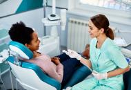 /content/dam/uhc/uhone/health-and-wellness/wide-WomanAtDentist-1422423507.jpg
